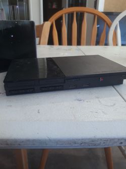 Ps2 +2 Controllers +4 Games