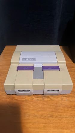 Súper Nintendo used for parts only no cables  it turns on but freezes pick up in panorama City