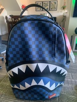 Blue and black sprayground backpack