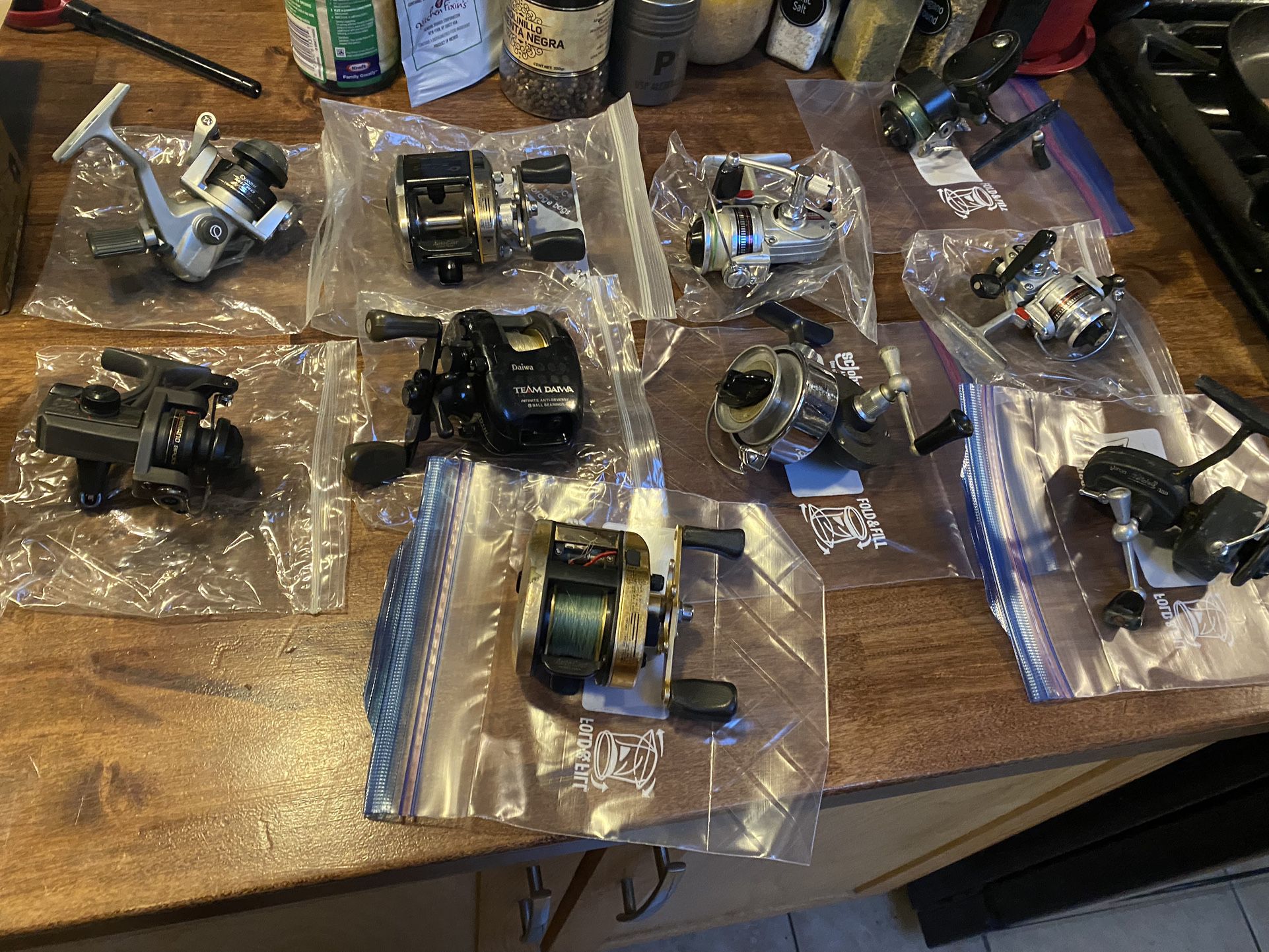 8 Batch Of Different Fishing Reels 