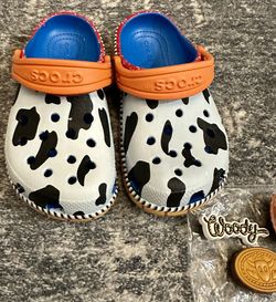 NEW! WOODY” TOYS STORY” CROCS! COMES W/4 LARGE CHARMS. THESE ARE HARD TO FIND! Have A Few Sizes Available 