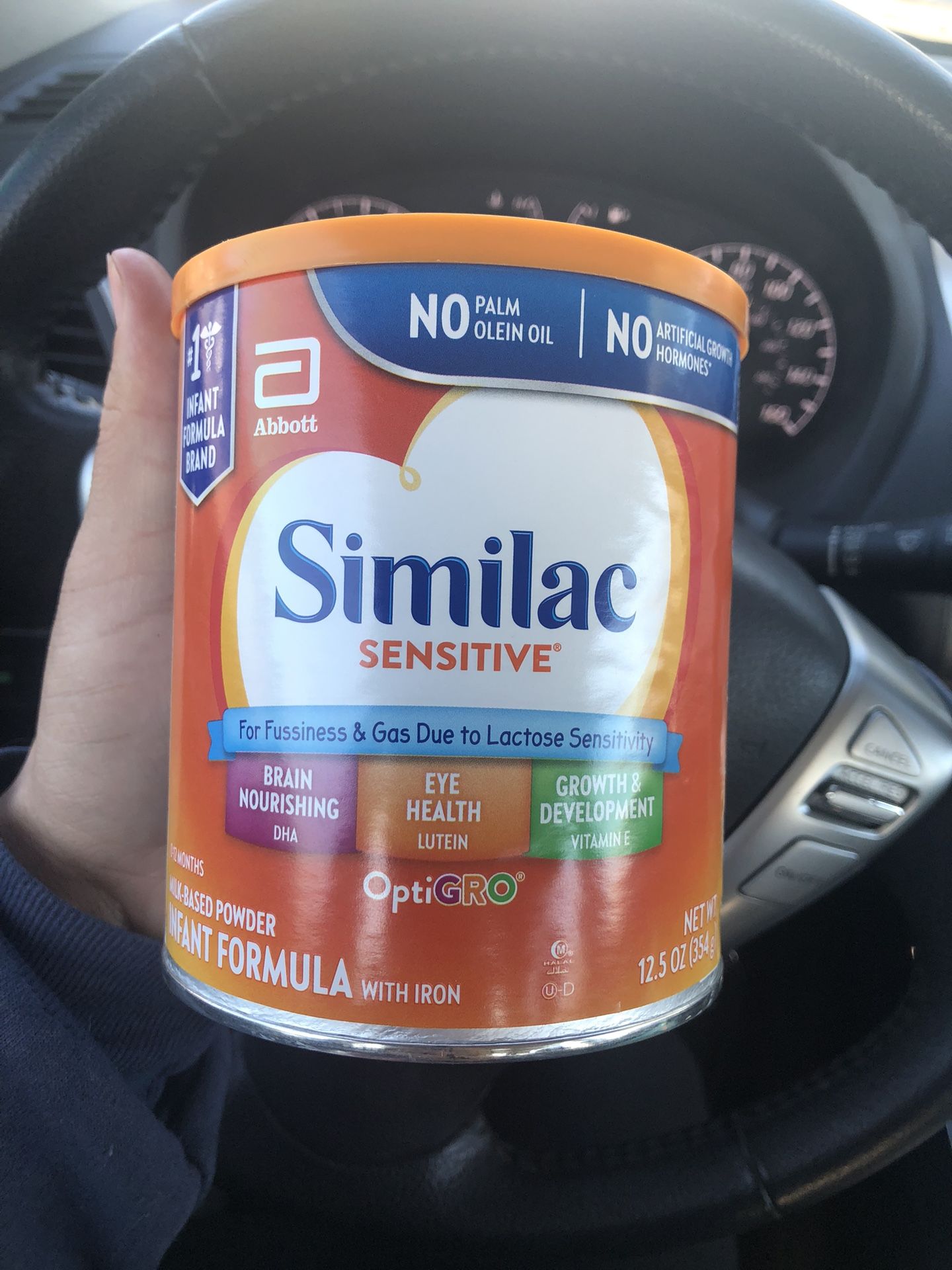 Brand new can of unopened milk and unopened diapers. Size 3.