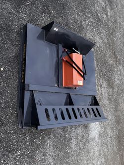 Skid steer bush cutter attachment