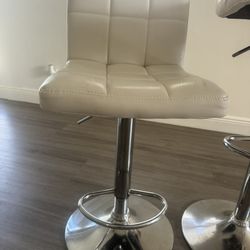 Pair Of Ashley furniture Leatherette Adjustable bar Stools 