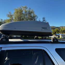Thule Roof Racks And Cargo Box. 