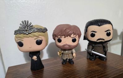 Set of 3 Game of Thrones Funko Pop vinyl figures featuring Cersei Lannister, Tyrion Lannister, and Jon Snow.