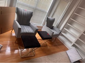 Two chairs and foot stool