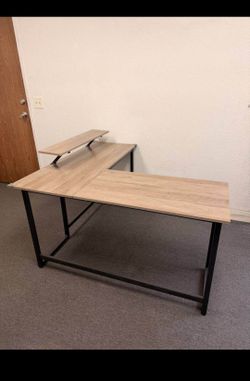 Brand new L-Shaped Desk.  Available in Hesperia.  Still in box.