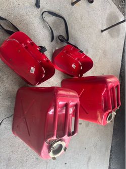 Metal gas cans with holder