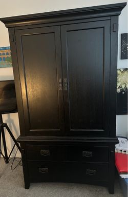 Solid Wood Armoire or tv stand 40wx74tall can be moved in two separate pieces 50.00