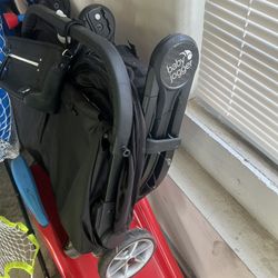 3 Car Seats And A Baby Jogger Dual Stroller