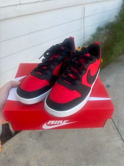 Youth 4.5 red and black Nikes