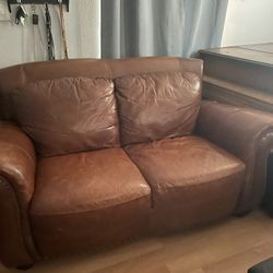 Leather Sofa $300, Leather Couch $500, Upright Piano $100, Baby Grand Piano $200