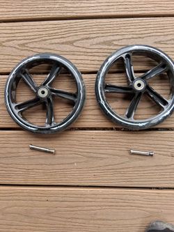 200mm scooter wheels, standard bearings, lightly used, comes with bolts.