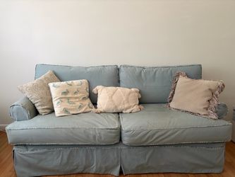 Light Blue Slipcovered Two-Cushion Sofa
