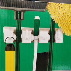 Mop and broom holder