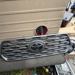 Toyota Tacoma grill upper bumper