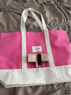 Lancome bag , serum, soft cream , lipstick and eye cream