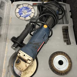 USED RYOBI ANGLE GRINDER WITH ATTACHMENTS IN CASE