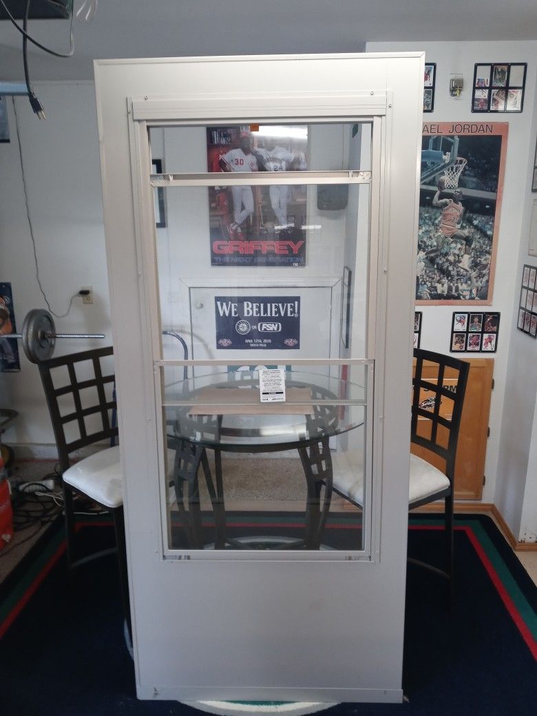 EMCO 35 1/4" x 79 1/4" Self-Storing Storm Door!