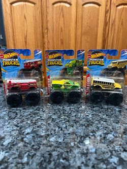 Lot of 3 Brand New Hot Wheels Monster Trucks.  Gunkster (Truck), 5 Alarm (Fire Truck and Bone Shaker (Truck).  Brand new factory sealed.