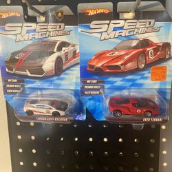 Hot Wheels  SPEED MACHINES  $ 45 EACH  NEW.    Red ENZO Ferrari and White Lamborghini 