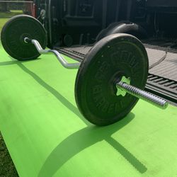 Like New Standard Curl Bar With 50 Pounds in Plates 