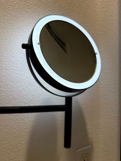 Magnifying bathroom mirror wall mount