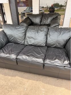 Black leather sofa and loveseat