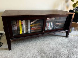 Glass front dark wood media center/console table
