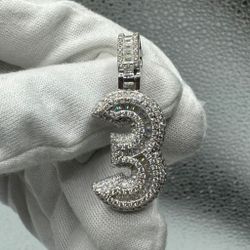 A Moissanite Number charm in Silver with moissanite of 2.35CTW