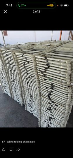 Used white folding chairs s,a,l, e