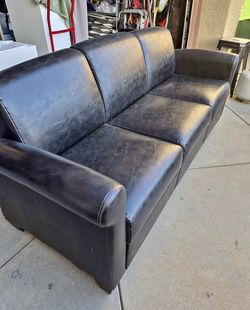 Free Modern black faux leather sofa – 77” W x 28” H x 26” D