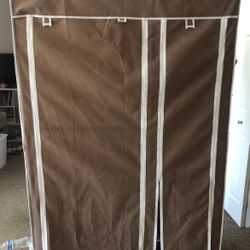 Portable closet for hanging clothes