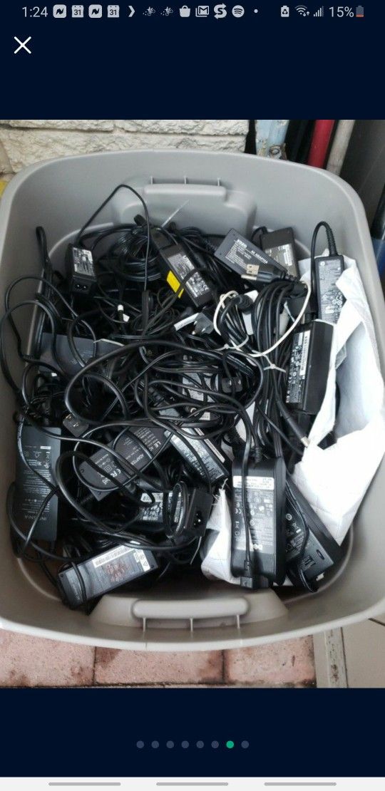 LARGE STORAGE BIN FILLED WITH TONS OF USED LAPTOP CHARGERS