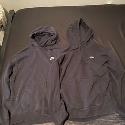 Large black Nike hoodies