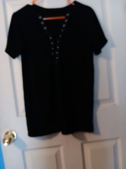Blusa taya s algo anplia muy comoda poco uso