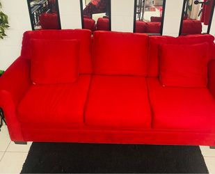Cindy Crawford red sofa