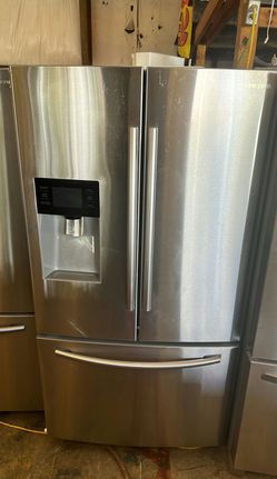 Modern Samsung French Door Refrigerator with Water Dispenser