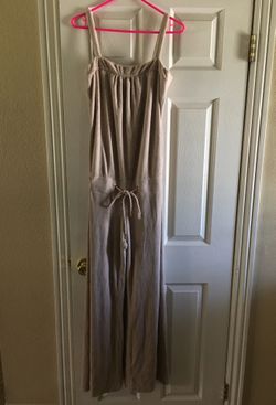 Women’s Juicy Couture romper size medium beige color