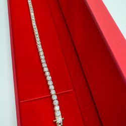 10KT Gold 4MM Tennis Braclet in 925 Silver with a CTW of 13.10