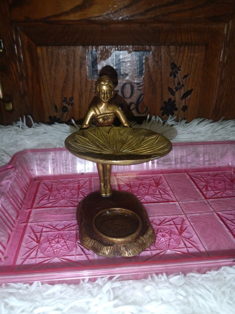 Antique 19th Century Solid Brass Piece Features Detailed Figure Of A Woman Holding A Tray For Sale.
