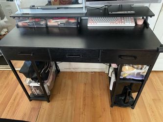 Desk with drawers and shelves