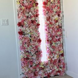 $250/worth of artificial flowers on styrofoam panels - flower wall