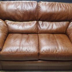 FREE Leather Couches & Rug Combo