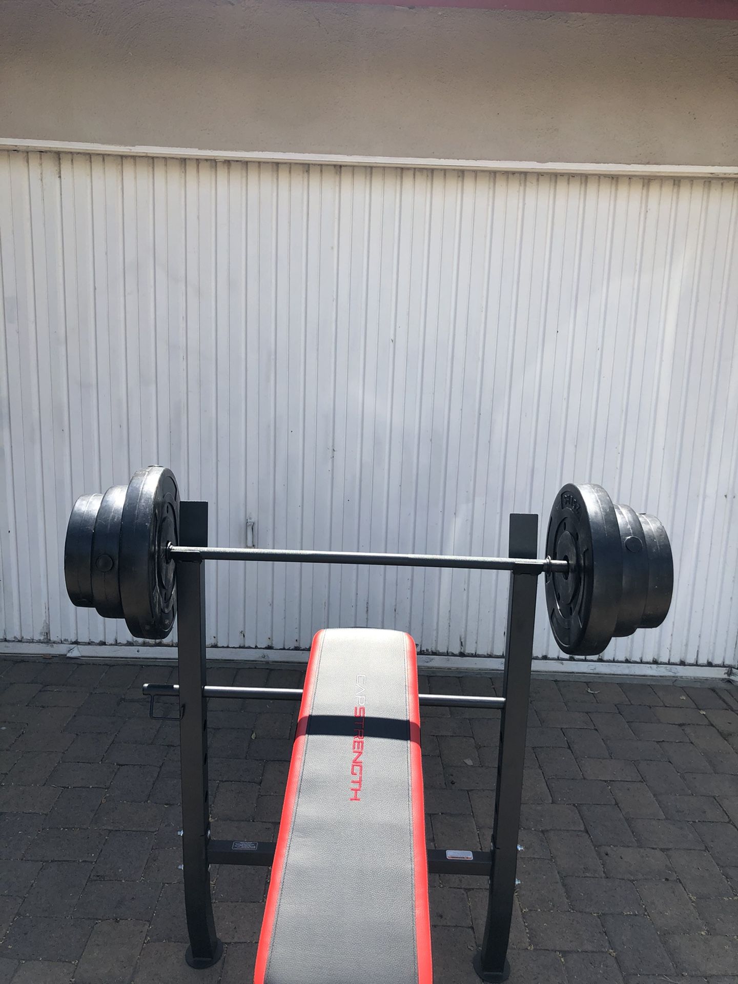 Bench press with Barbell and leg developer combo with 100 lb Weight Set