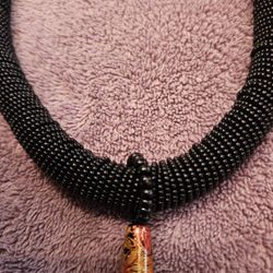 15.5" black beaded rope w/ 2" boho pendant