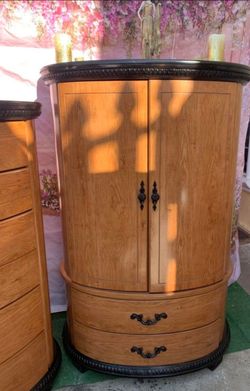 Two extra large cabinets or closets are in very good condition top of cabinets has been refurbished no scratches also the bottom  are oversized pieces