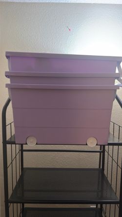 Purple buckets with wheels