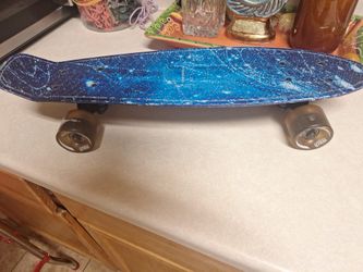 22 Inches "SKITCH"  SKATEBOARD MINI CRUISER BOARD BLUE GALAXY  $40. FIRM PRICE 